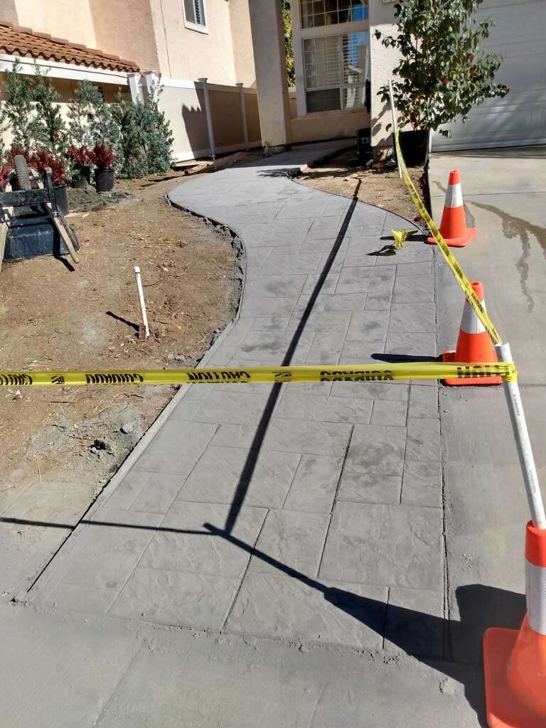 Illuminated pathways and focal points with professionally installed landscape lighting